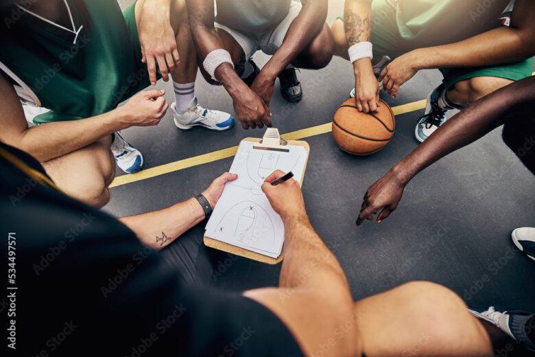 Basketball Coach with Team